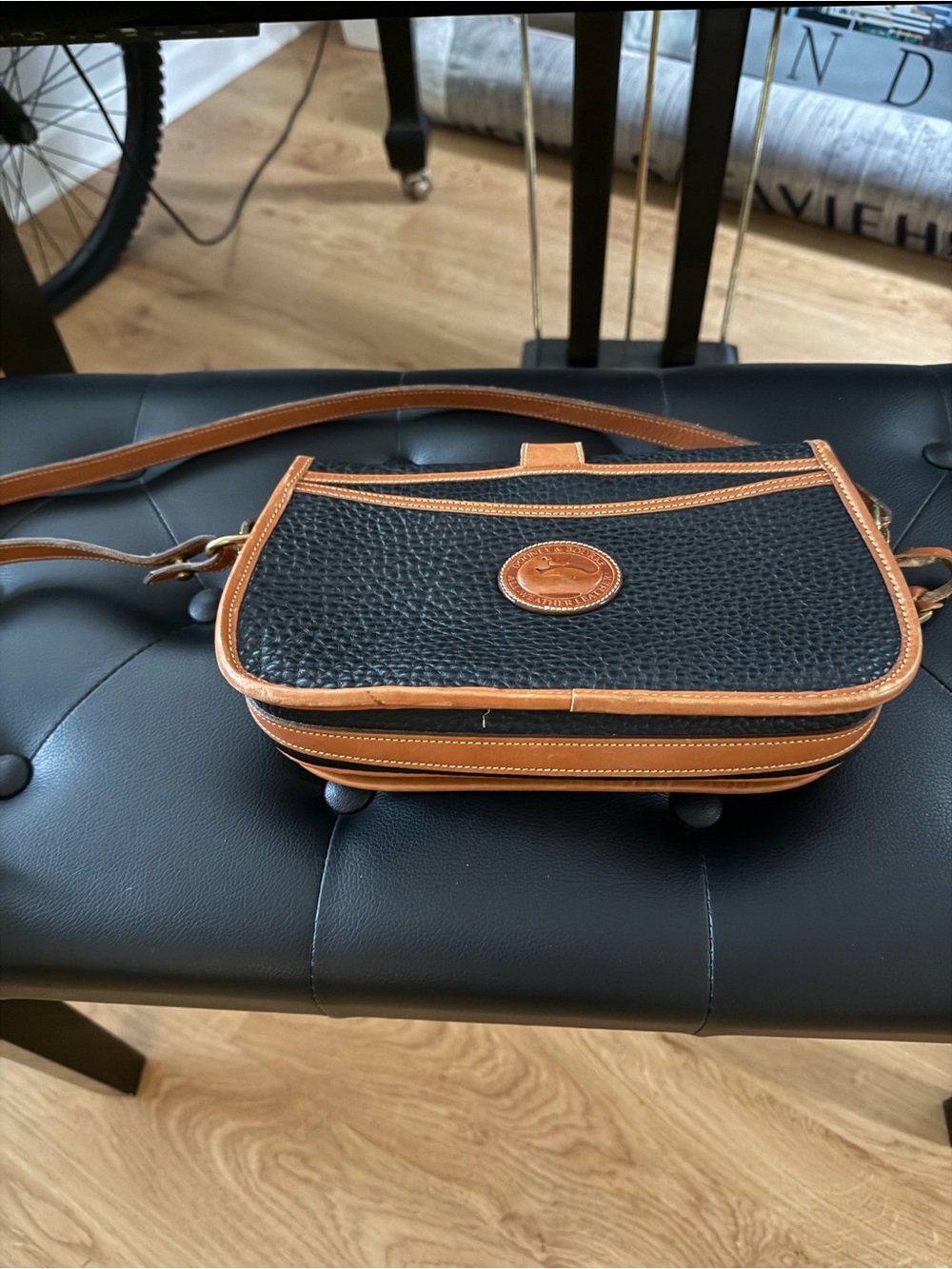 Dooney & Bourke AWL Black Pebbled Leather Crossbody with Cognac Trim